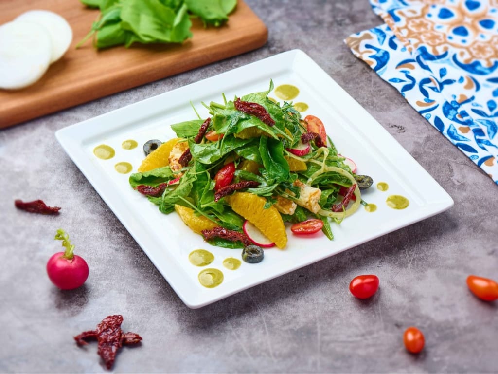 سلطة الجرجير بصوص البيستو